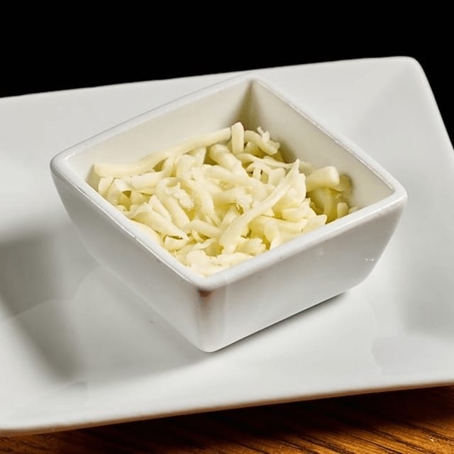 4 oz Shredded cheese.