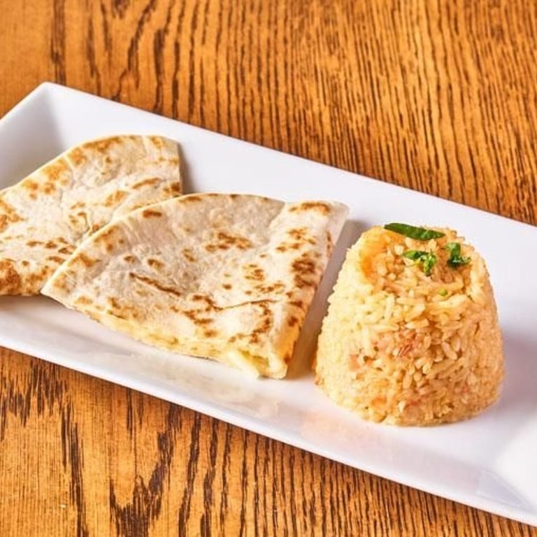 Indulge in Our Quesadilla